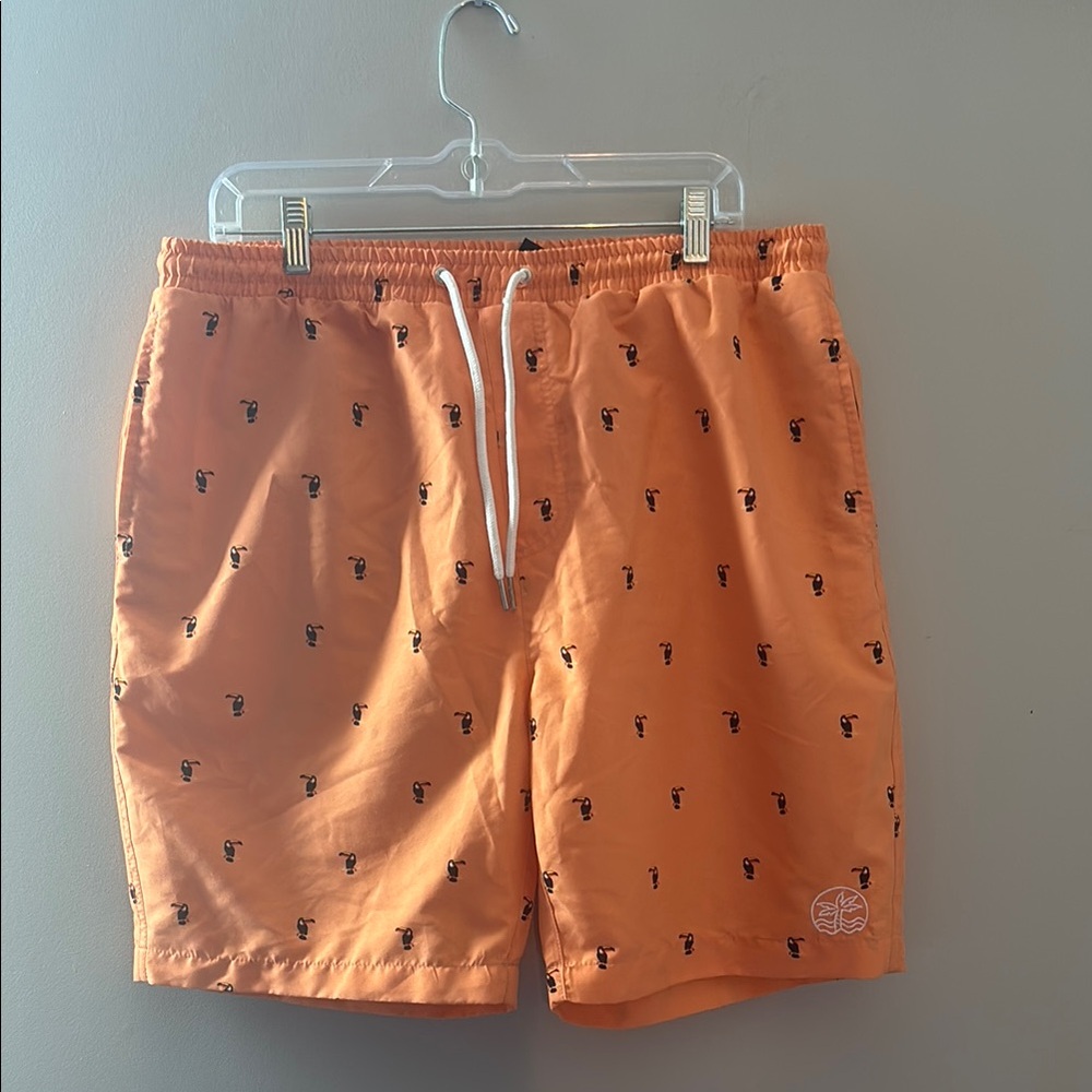Men's Coral Swim Trunks with Toucan Print